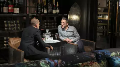 Two patrons having a conversation at HEDGE Privé Autumn Edition event