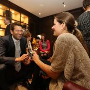 Guests engaged in conversation at one of HEDGE's event receptions.